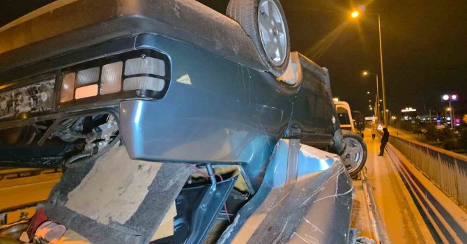 Takla atan otomobilden burunları bile kanamadan çıktılar