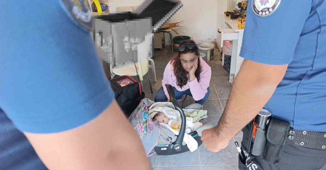 Hırsızlık ihbarına giden polis, özel garajda 5 aylık bebekle annesini buldu