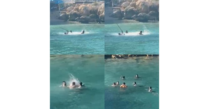 Mersin’de denizin ortasında sopalı kavga kamerada