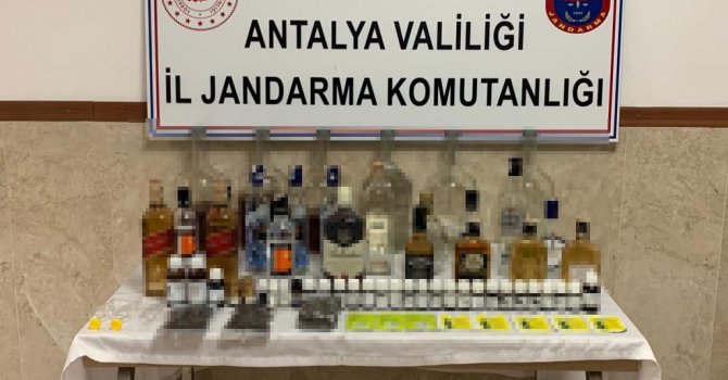 Evinde sahte içki üretirken yakalandı