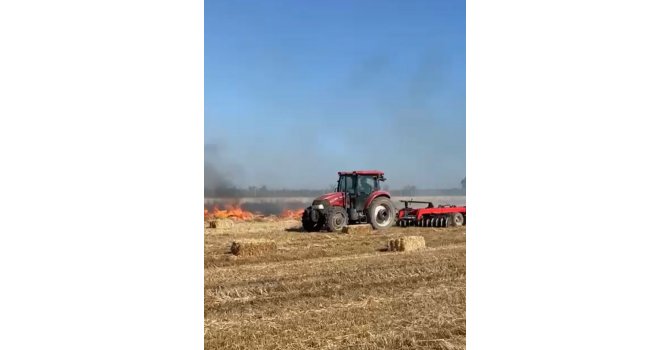 Saman balyalarının bulunduğu arazideki yangın 1 saatte kontrol altına alındı