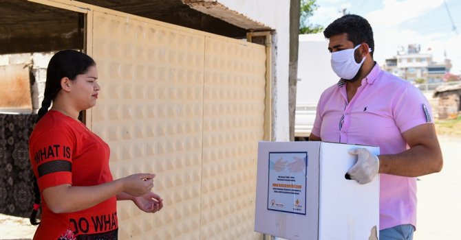 Karantinadan çıkan mahalleliye destek