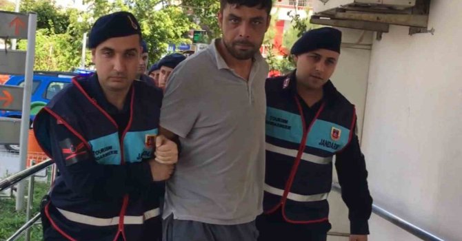 Bir aileyi öldürüp yaktığı iddia edilen şüpheli tutuklandı