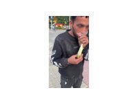 Caddede güpegündüz bali çekip kendinden geçti