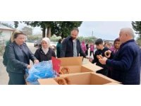 Kozan’da şehit aileleri ve gazilerden öğrencilere simit ikramı