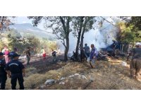 Kumluca’da odunlukta başlayan yangın boş evin bahçesine sıçradı
