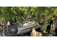 Takla atarak bahçeye uçan otomobilin sürücüsü yaralandı