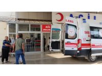 Devrilen traktörün altında kalan muhtar ağır yaralandı