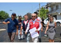 Altınova’da 4 mahalleyi birbirine bağlayan caddeye sıcak asfalt