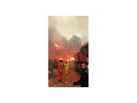 Antalya’da ekipler alevlerin arasında kalmaktan son anda kurtuldu