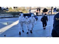 Testi pozitif çıkan şüpheli şahıs, tulum içerisinde adliyeye sevk edildi