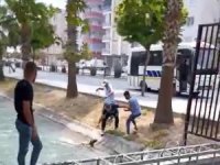 Suya düşen köpeği kurtarmak isteyen gençlerin zor sınavı