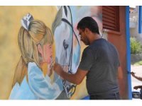 Toroslar Belediyesi hayvan sevgisi duvarlara taşıdı