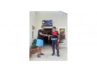 Jandarma para dolu cüzdanı sahibine teslim etti