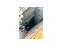 İskenderun’da binanın havalandırma boşluğuna düşen yavru kedi kurtarıldı