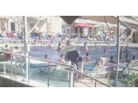 Otelin havuz başında kafasına düşen baca kapağıyla ölümden döndü