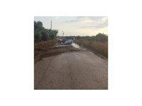 Kayganlaşan yolda takla atarak durabildi