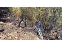 Evinin önünde yaktığı ateş yangına neden oldu