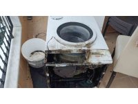 Çamaşır makinesi alev aldı, kadın dumandan etkilendi