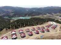 Orman ve baraj manzaralı deprem konutları