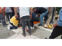 Kestiği dalı ayağıyla iterken düşen işçi ağır yaralandı