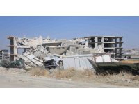 Deprem etkisi yaşatan 12 katlı binanın yerle bir olduğu anlar kamerada