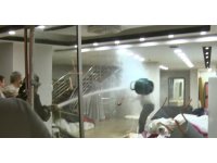 Eşinin mağazasına girip gelinliklerin üzerlerine kolonya döktü, tüpe çakmağı dayayınca tazyikli suyu yedi