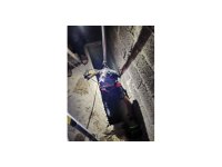 Hatay’da havalandırma boşluğuna düşen kedi kurtarıldı