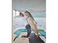 Olta ile 60 kiloluk balık yakaladılar, gelirini kimsesiz çocuklara bağışladılar